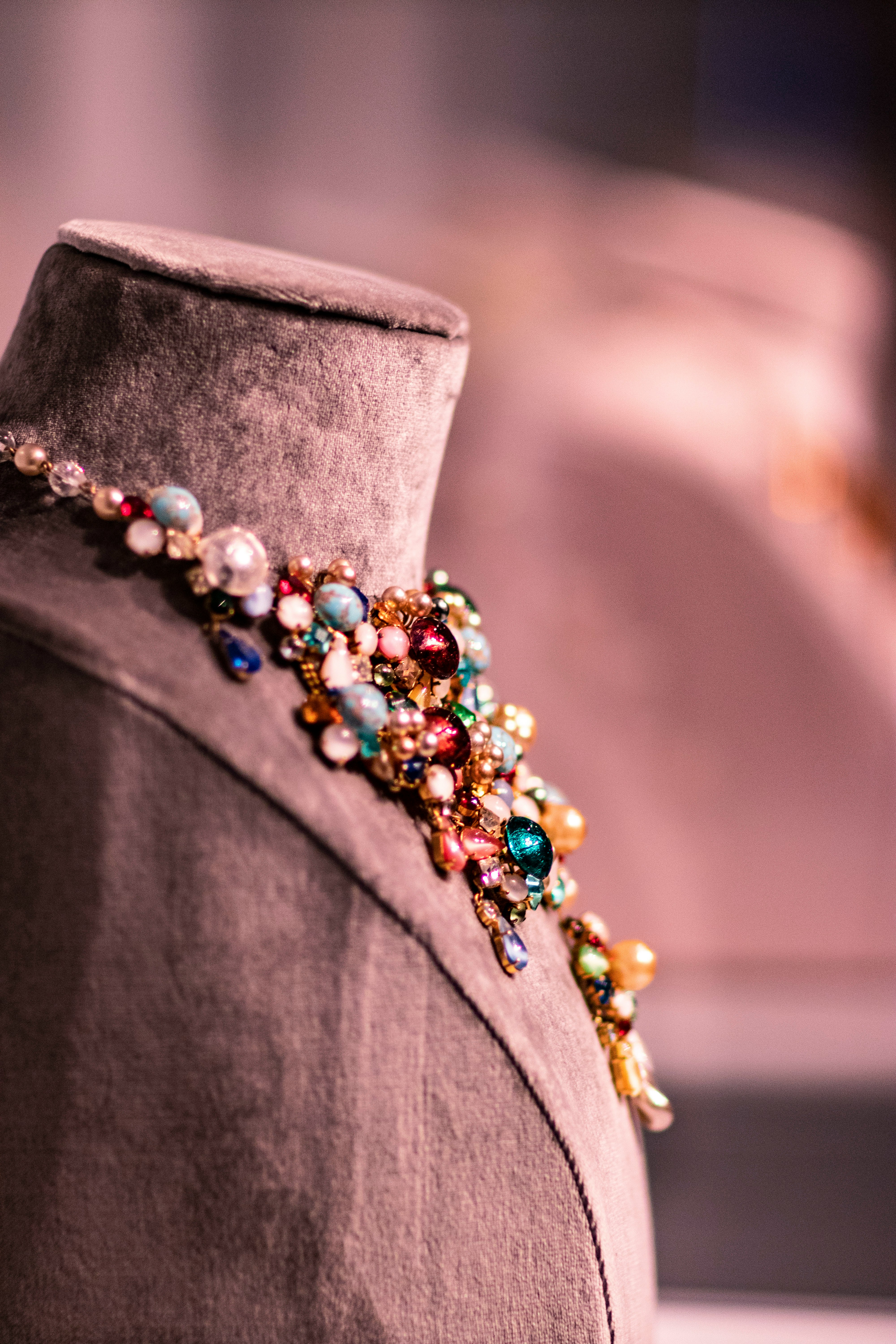 Custom beaded gemstone necklace on display