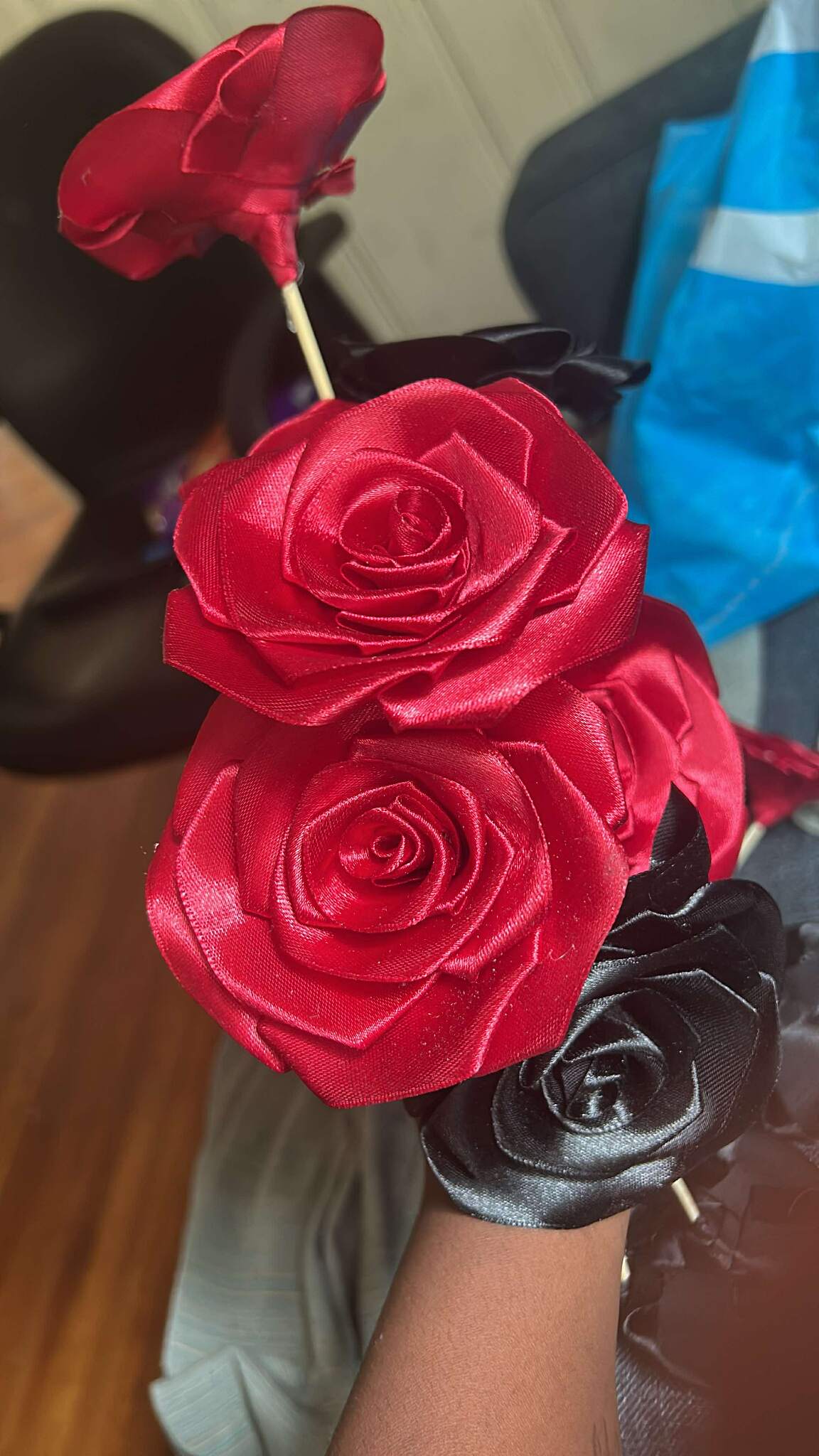 Handcrafted red and black satin ribbon roses